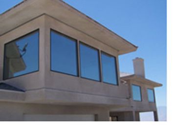 Custom home with solar silver 20 series window tint Installed  on the windows JohnsonWindow Film
