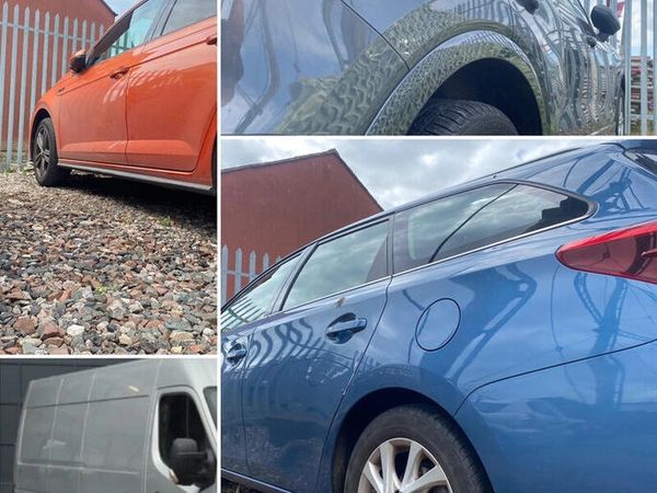 a group of motor cars parked in a secure gated car park in Carlisle City Centre.