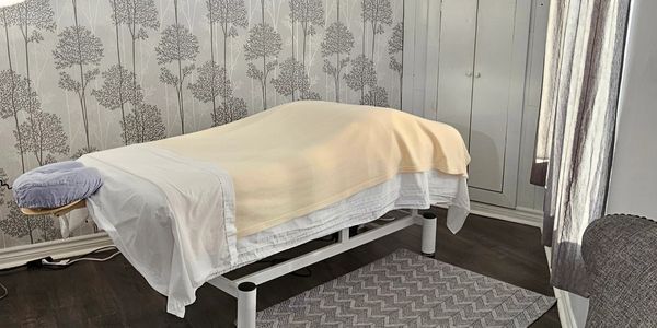 The bright, clean and welcoming massage therapy room at Clarkson