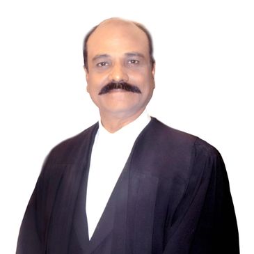Man in formal black lawyer's robe with white shirt and vest.