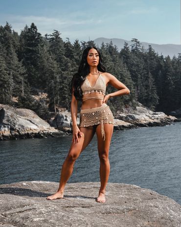 lifestyle photography of woman wearing crochet Beach Cover Up Pants High Waisted Vacation outfit