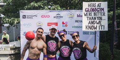 competitors posing for their winning photo at a fitness event