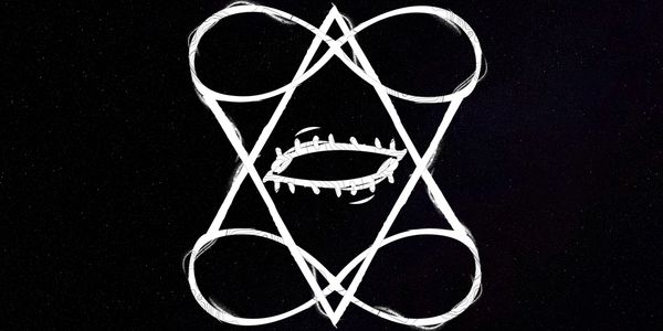 White abstract geometric shapes on a black background forming a symmetrical design.