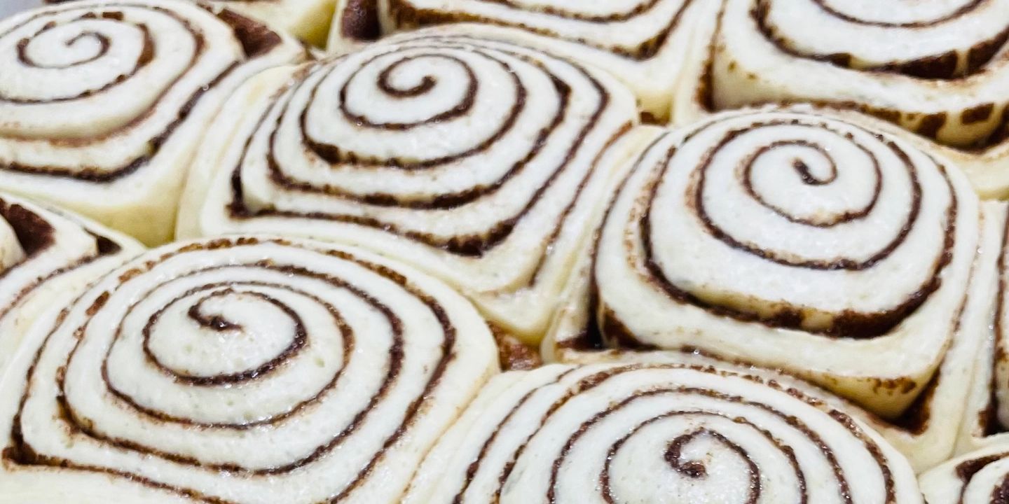 plump cinnamon rolls ready to be baked!
