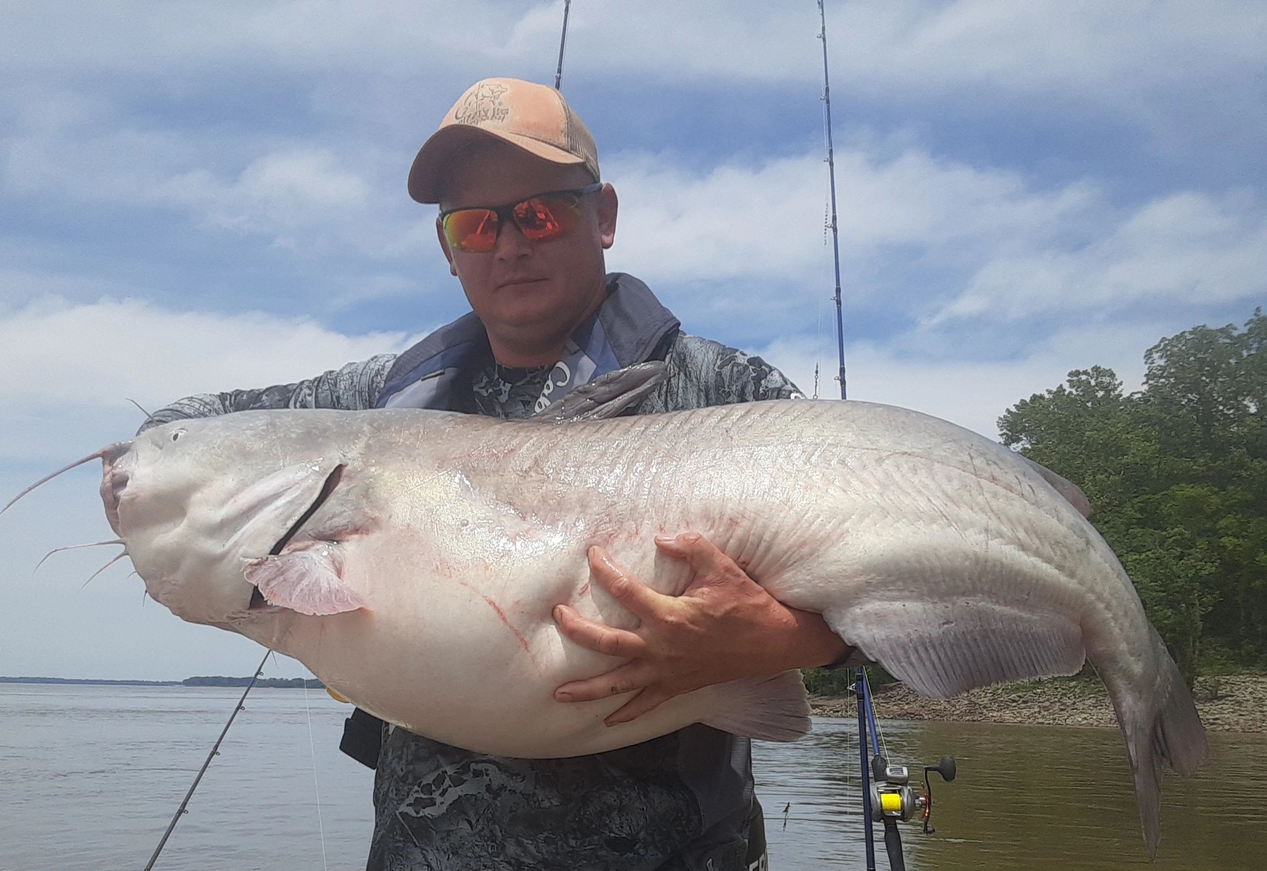 Dustin with a monster Mississippi River Blue!