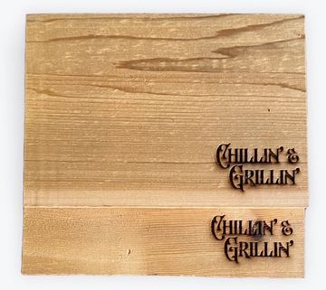 Solid cedar planks engraved with 'Chillin' &amp; Grillin'' text, perfect for grillin