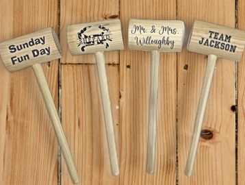 Crab mallets engraved with a variety of designs