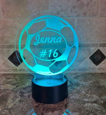 Illuminated soccer-themed night light with "Jenna #16" inscription.