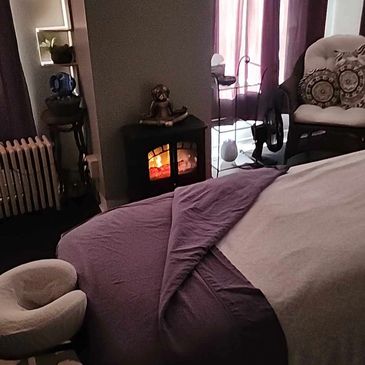 Massage therapy room at Totally Worth It Wellness in Manchester, NH
