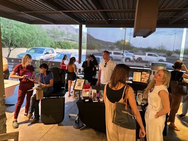 photo of event guests on the patio at dibellas