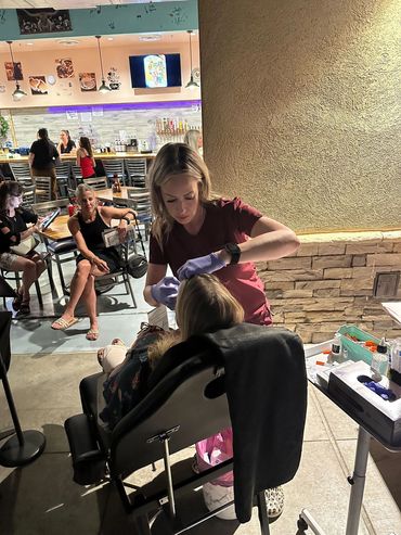 photo of britni brunsma giving botox injections