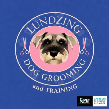 Logo for Lundzing Dog Grooming and Training featuring a dog's face.
