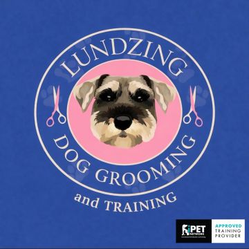 Logo for Lundzing Dog Grooming and Training featuring a dog's face.