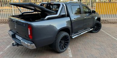 Remote opening Rigidek EZlift bakkie tonneau cover on a Mercedes Benz X-Class.