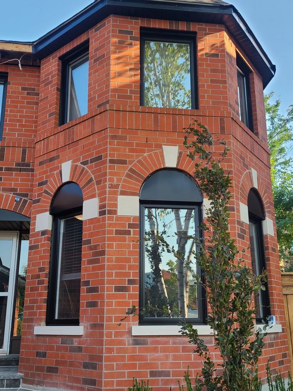 Black vinyl window painting services in Toronto. Exceptional quality and factory like finish.