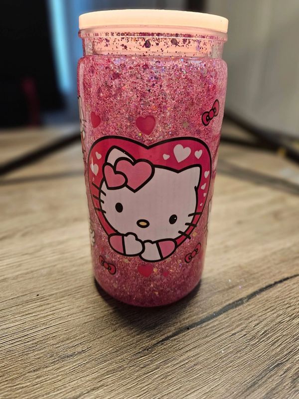 HK snow globe glitter cup with tons of pink glitter.