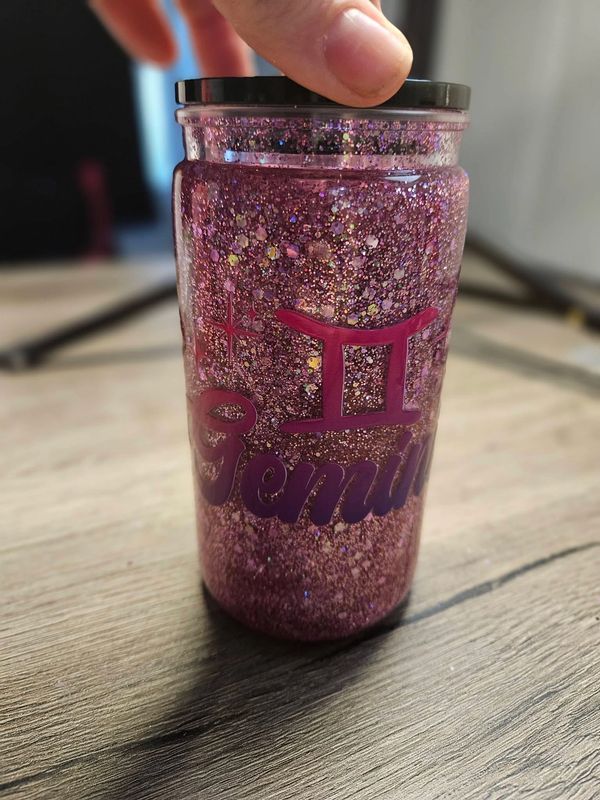 Gemini snow globe cup with tons of purplr and pink glitter.
