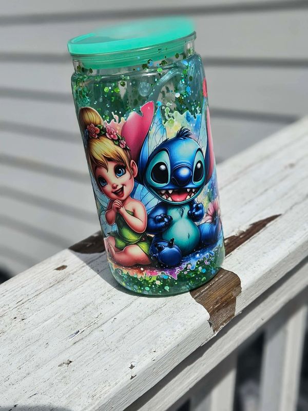 Colorful cup featuring Tinker Bell and Stitch with glitter inside.