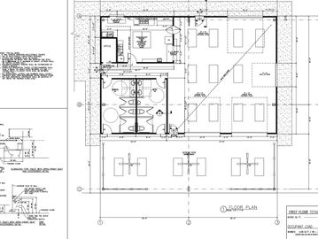 Architectural floor plan showing room layouts and measurements for a building.