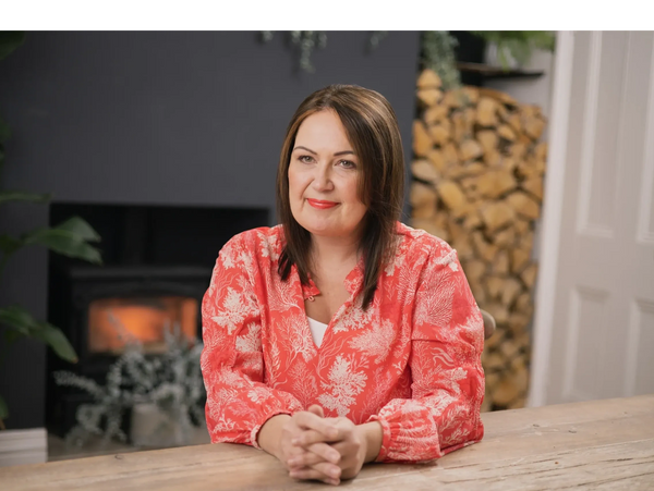 midwife lesley sitting at a table