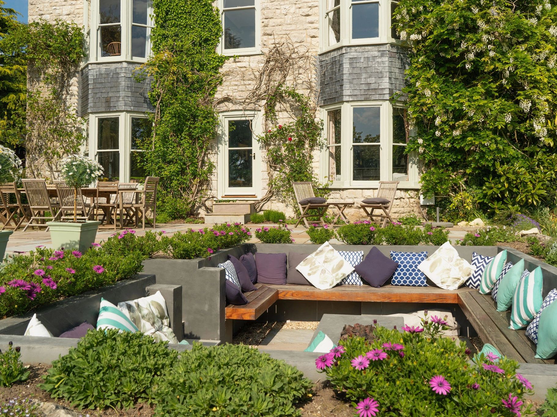 Nethergrove Dorset luxury holiday home fire pit and al fresco terrace.