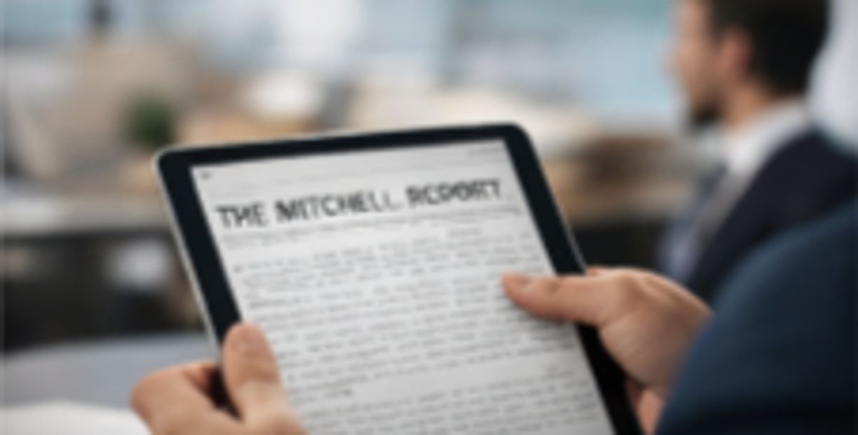 A man reading girl Medical report on Tab screen