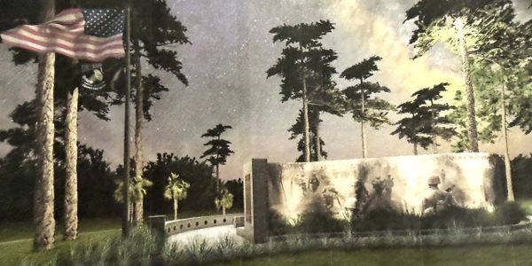 A nighttime memorial scene with American flags and soldier silhouettes on a lit wall.