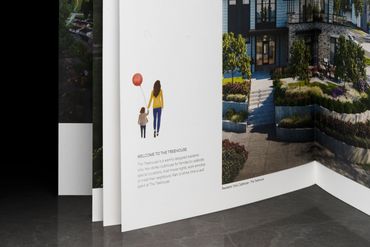 Open brochure showing a photo and illustration of a woman and child with a balloon.