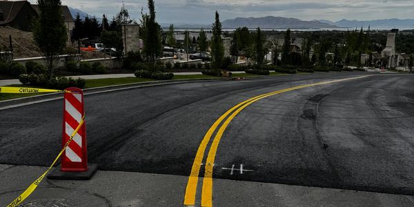 Durable centerline roadway striping applied with proper traffic control — the same standard of work Madsen Striping delivers on Idaho roadway projects.