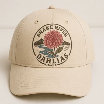 Beige cap with 'Snake River Dahlias' logo and floral design.