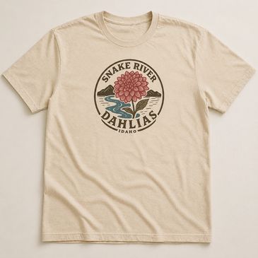 Beige T-shirt with Snake River Dahlias graphic and Idaho text.