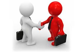 Two business figures shaking hands with briefcases.