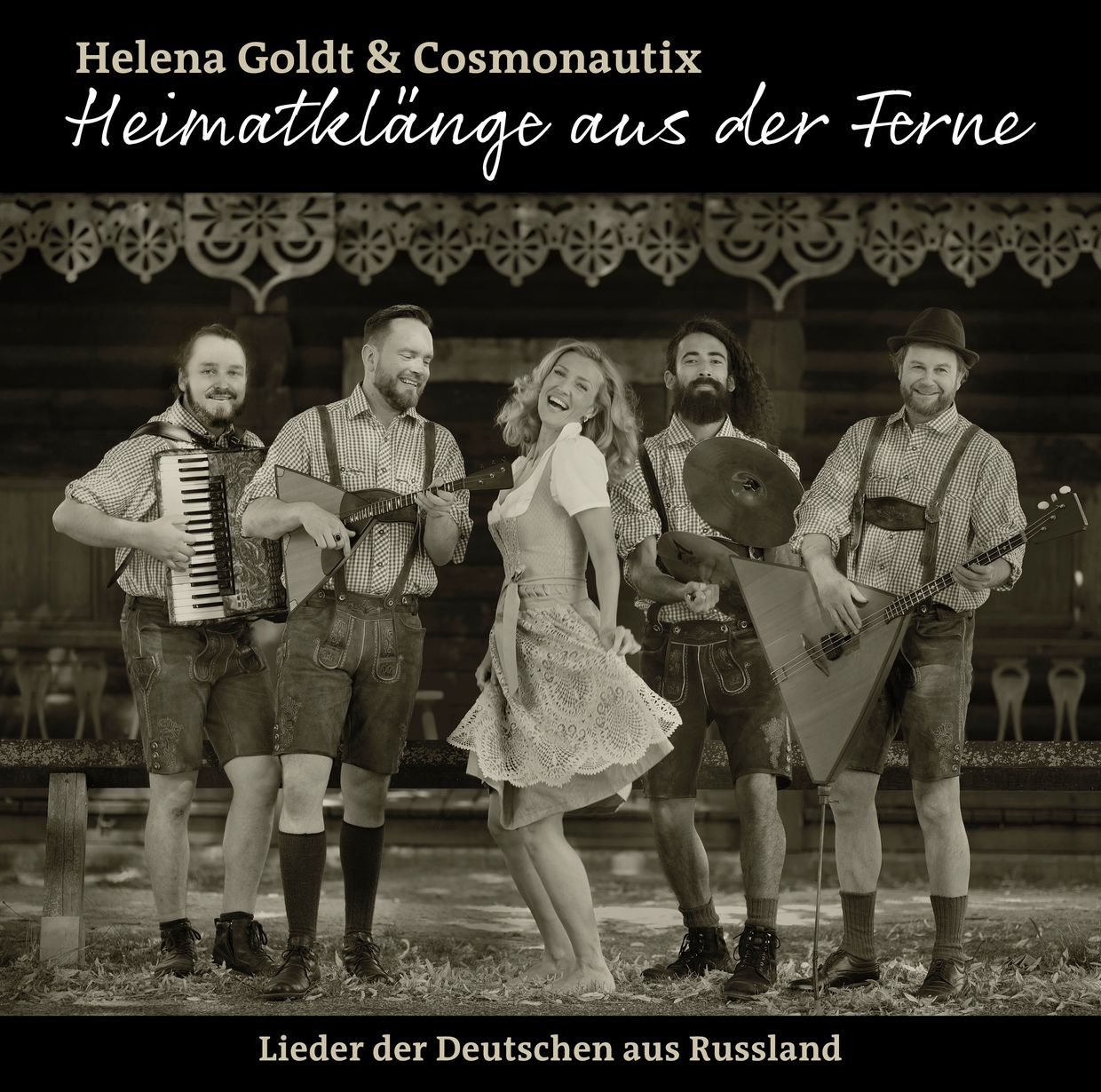 Band in traditional German attire performing with folk instruments.