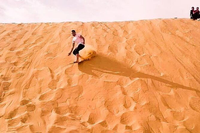 Skateboarding for beginners in Dubai's desert safari - where adventure starts on the golden dunes.