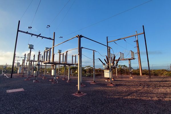 Electrical substation with clear blue sky in the background.