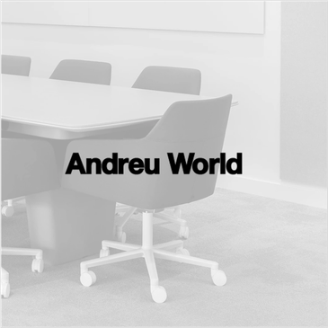 Modern office chairs around a table.