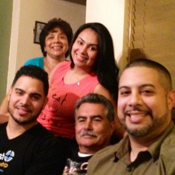 The Soto Family taking a group photo.