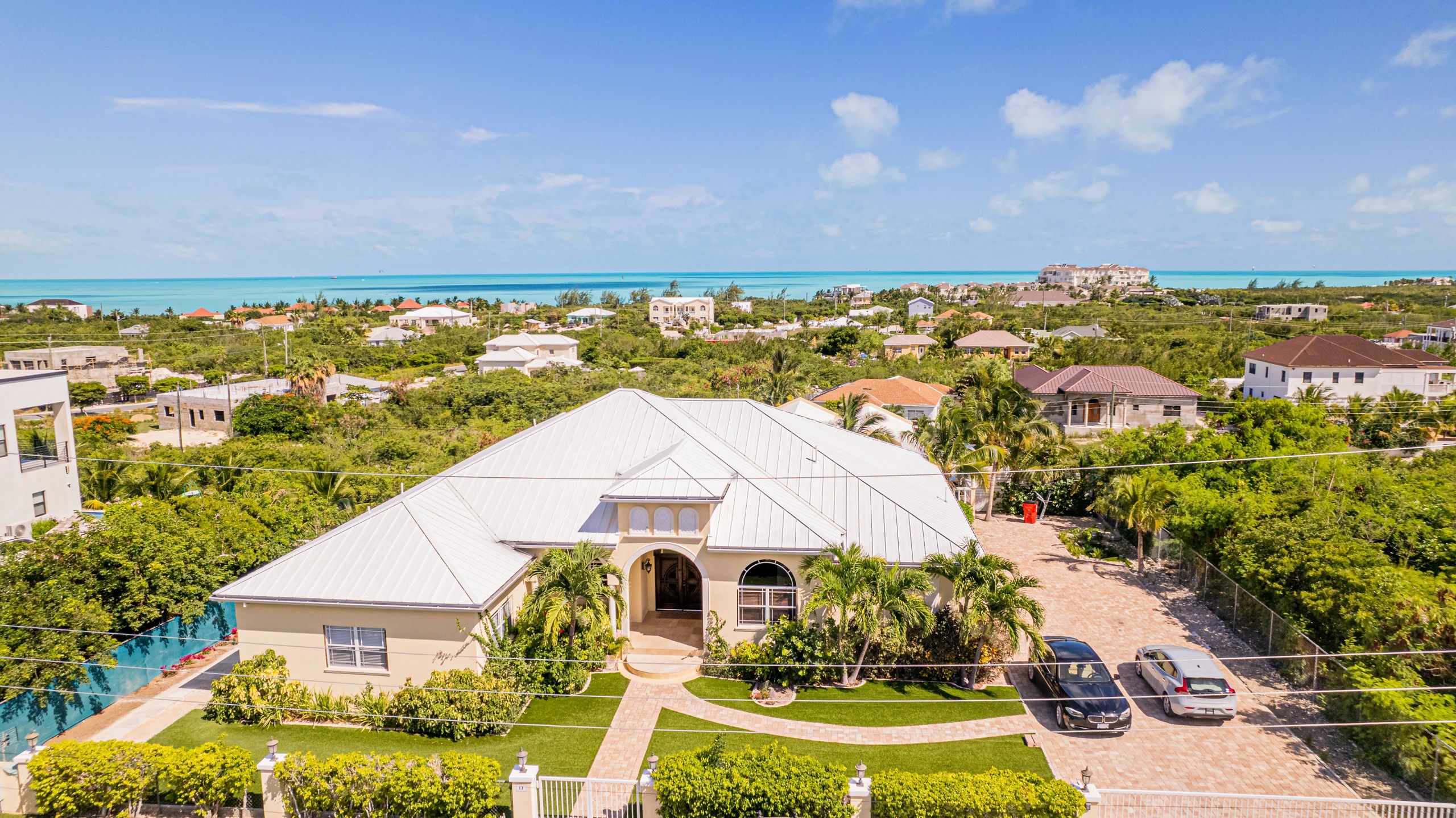 Sky Blue vacation rental with the turquoise waters of Turks and Caicos in the background.