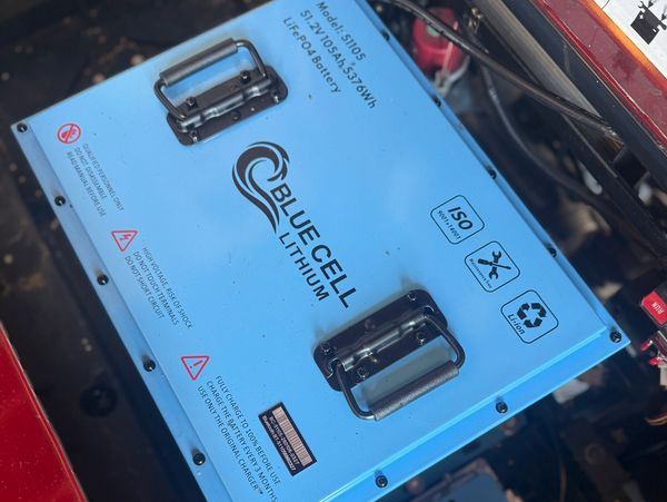 BlueCell Lithium battery pack with handles for easy transport.