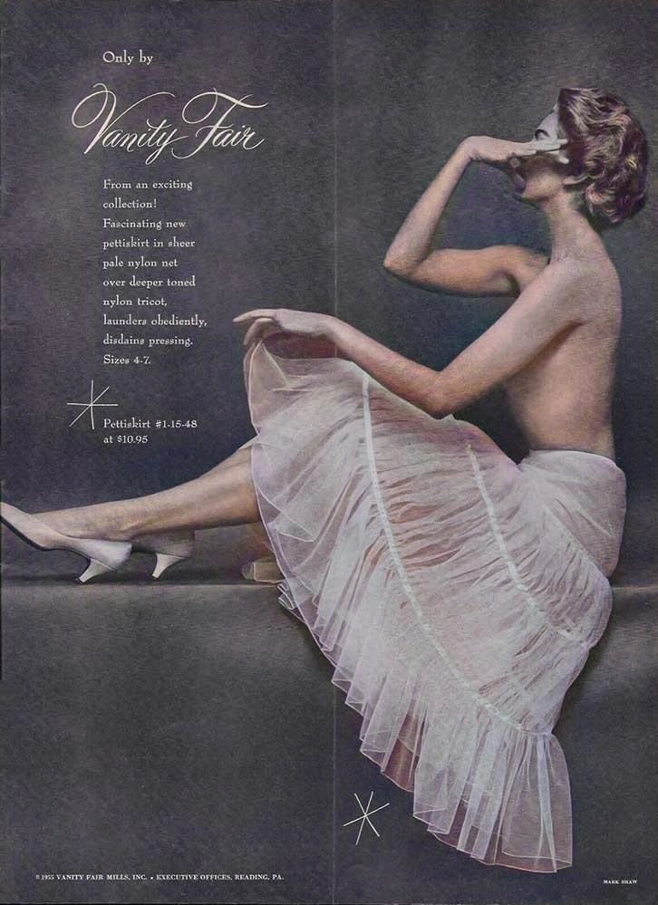 Look away - don't show your face. 1950's Vanity Fair advertising.