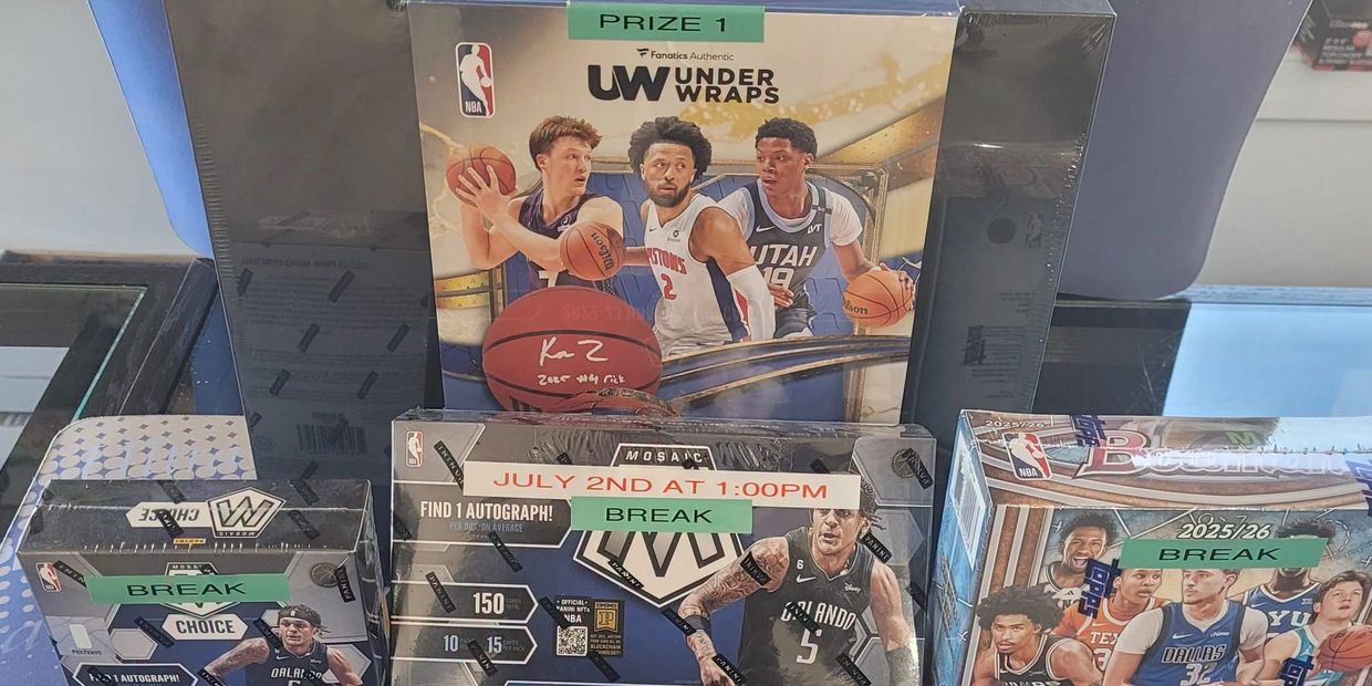 NBA trading card boxes and a prize basketball set on display.
