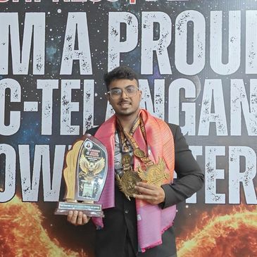 Man proudly holding trophies and medals with a Telangana Powerlifter backdrop.