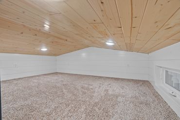 Mini home loft bedroom