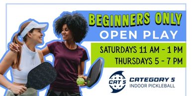 Two women enjoying beginner-only open play pickleball sessions.