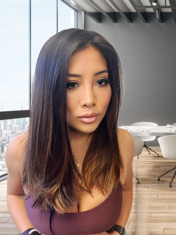 brunette Asian girl who had a keratin treatment done to her hair