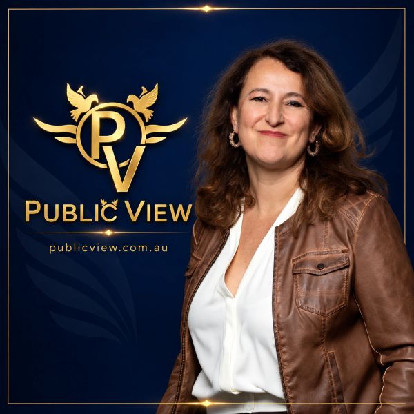 Woman in brown leather jacket with Public View logo.