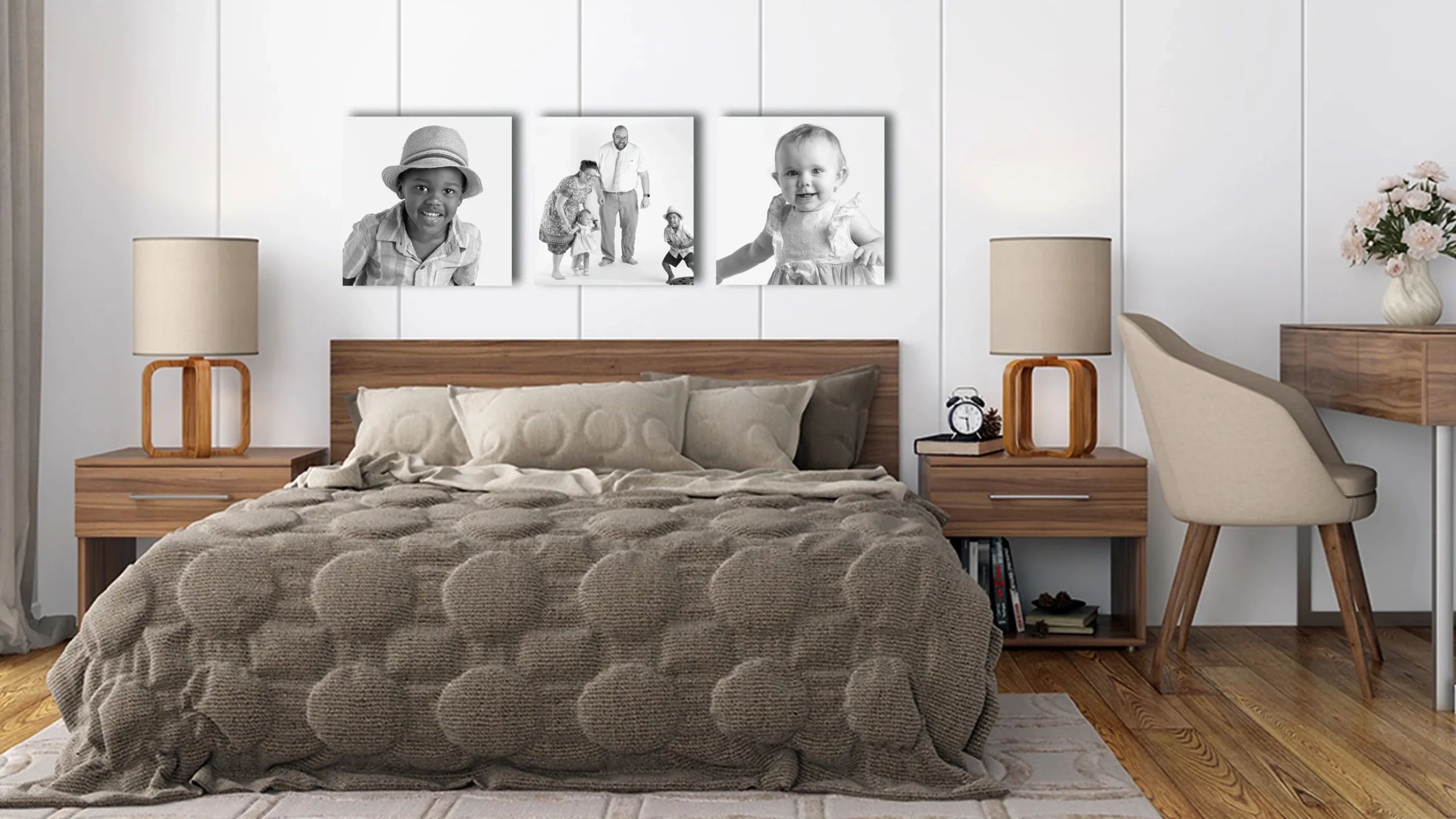 Bedroom with portraits on wall.