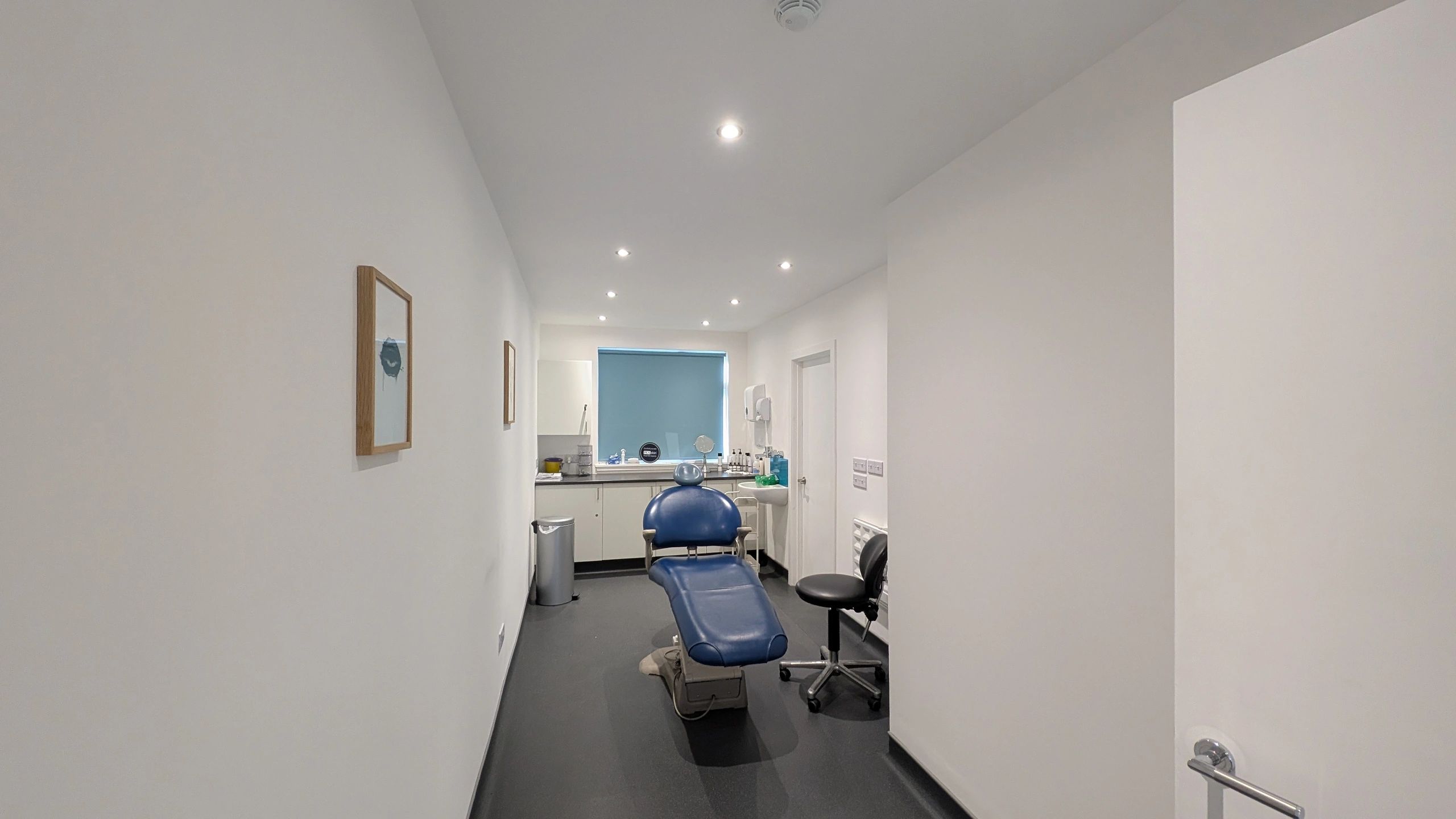 A clean, modern dental or medical examination room.