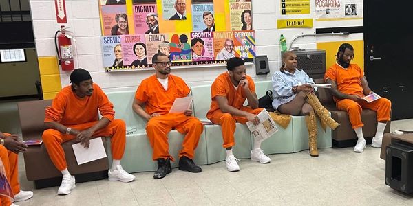 CEO E. Carter joins incarcerated men at the dc jail to speak on better educational opportunities 