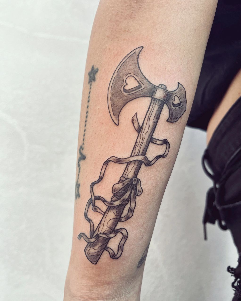 axe tattoo sarah peluso